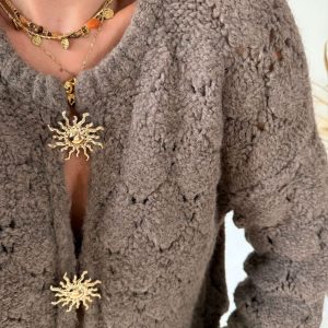 Cardigan broches soleil
