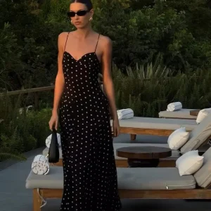 Robe noire pois blanc